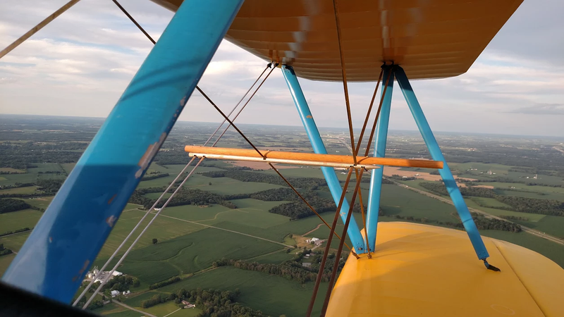 Illustration for article titled "Hold the stick, I got to snapchat this"....Let's fly a Biplane!